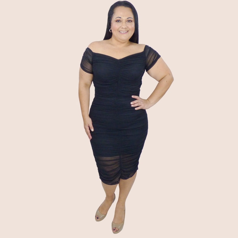 This power mesh two-piece dresse fatures cap sleeves and ruched details that create the perfect shape. The skirt is fully lined for coverage and has an elastic waistband.