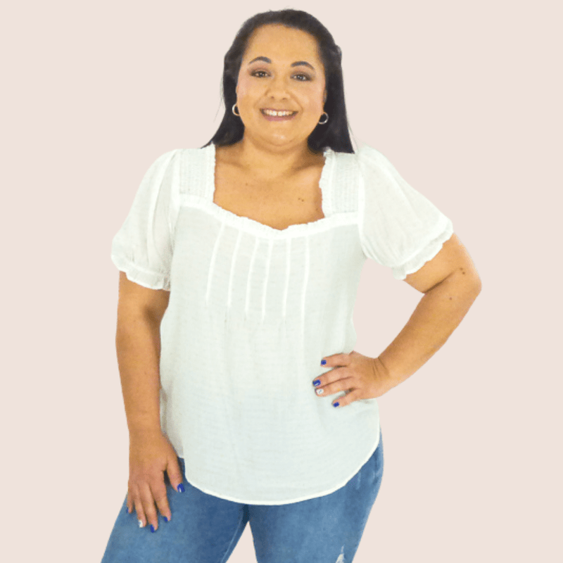 This Short Sleeve Polka Dot Plus SIze Top is a lightweight and super cute way to dress up your everyday look. Wear it with jeans for a casual look that's totally on trend.