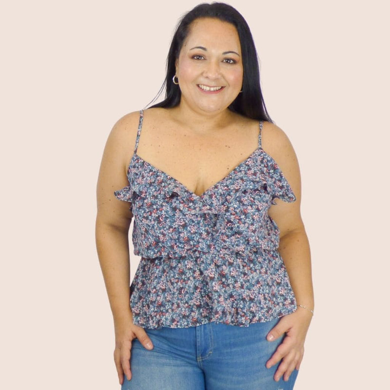 Our Ruffle Floral Plus Top with adjustable spaghetti straps give it an effortlessly look while the elastic waistline adds comfort. A great layering top.