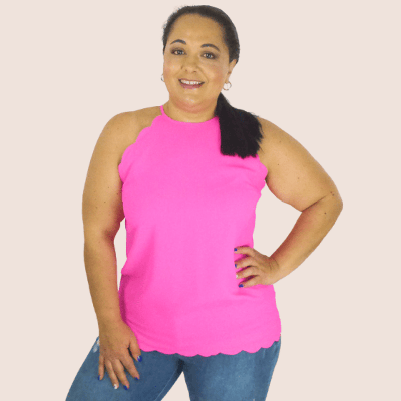 Whether you're headed to the beach or relaxing in the yard, this plus size top is just what you need. With a scalloped hem, this sleeveless shirt will brighten up your day.