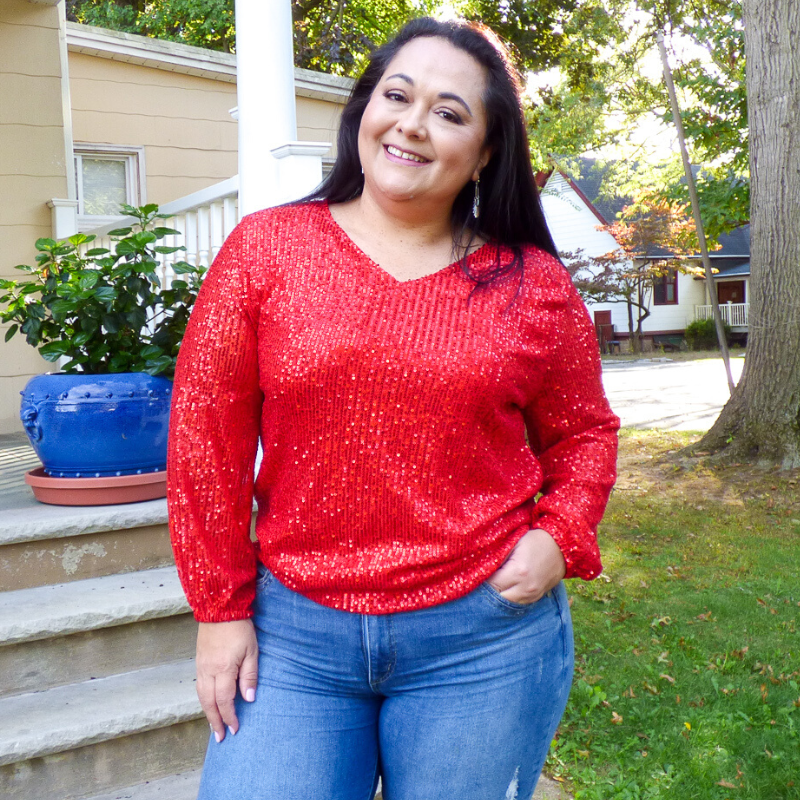 This gorgeous Sequin Long Sleeve Plus Size Top can be worn to all ocassions. It feature all over sequins, lined bodice and 3/4 sleeves. Available in Red & Green