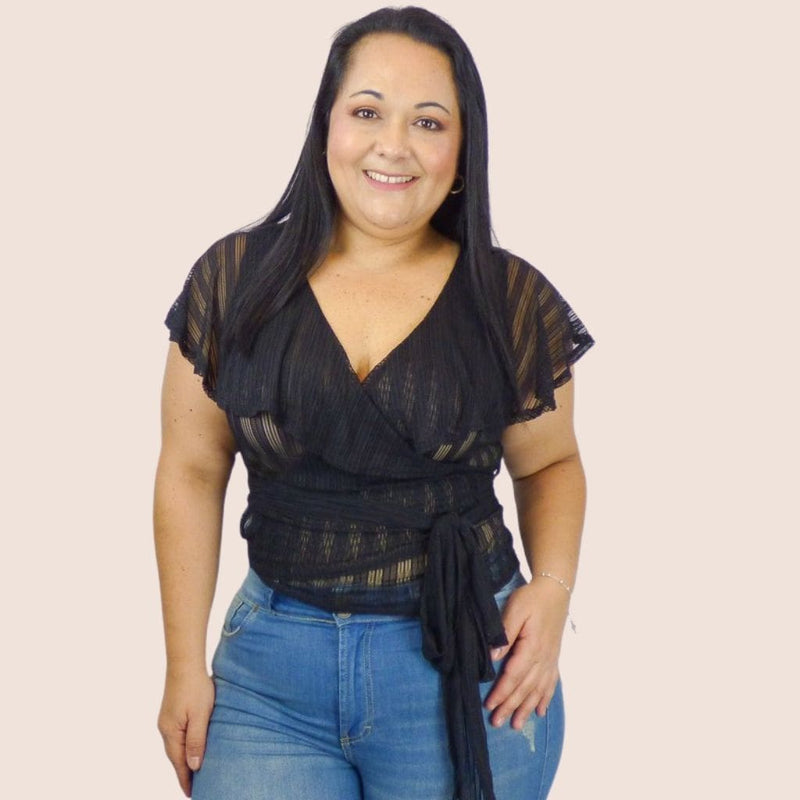 This plus size sheer lace top is ideal for the woman who wants to show off her curves. This is a great top for a date night or a night out on the town with the girls.