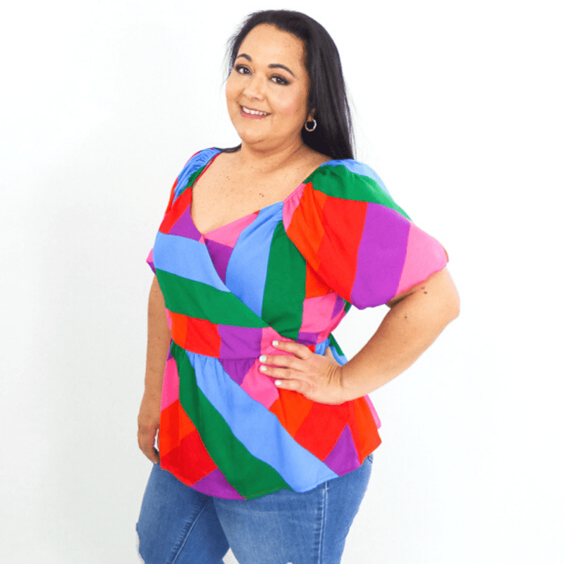You never have to travel far to find color with this bright and pretty top! Style it with skinny jeans and strappy sandals for a fun day out with friends.