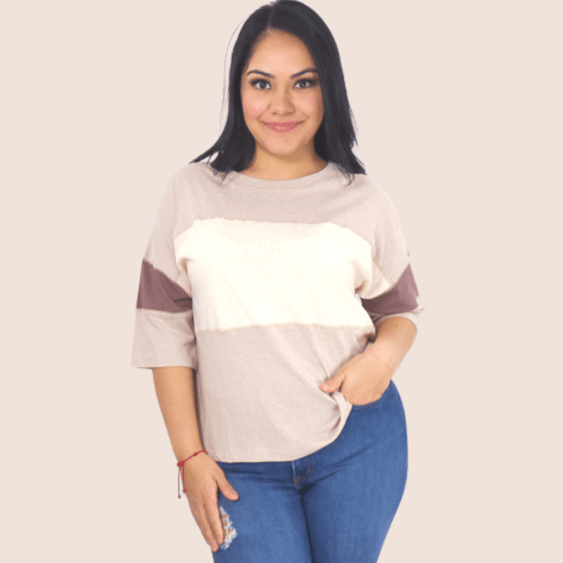 This Half Sleeve Color Block Top is made with light, breathable material perfect for warmer days. The relaxed fit and round neckline make it stylish without being too revealing.