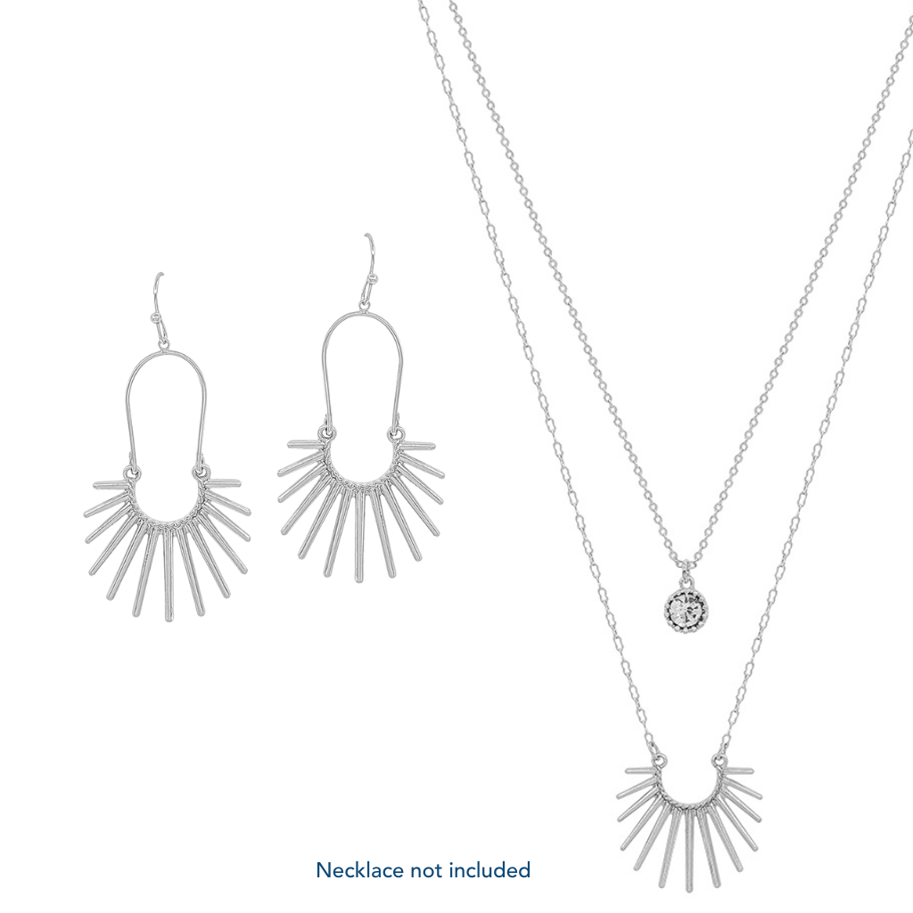 These Silver Starburst Drop Earrings feature a starburst drop in Matte Silver. Pairs well with matching Silver Sunburst and Crystal Necklace. Available in Silver & Gold