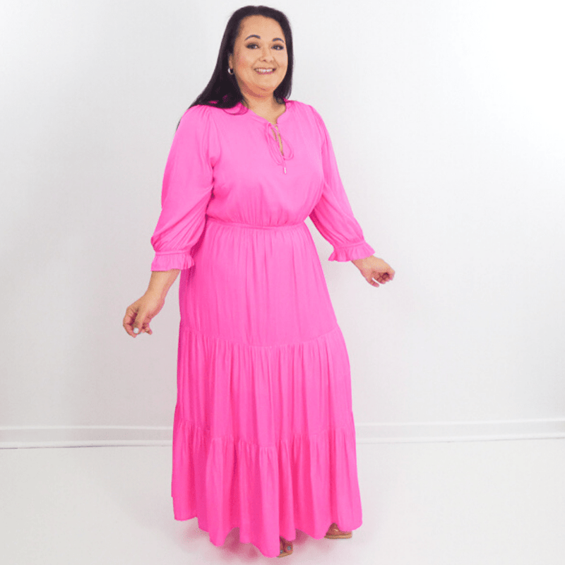 Keep yourself looking good in our split neck tiered long plus size dress, designed with a a relaxed fit, and features balloon long sleeves.