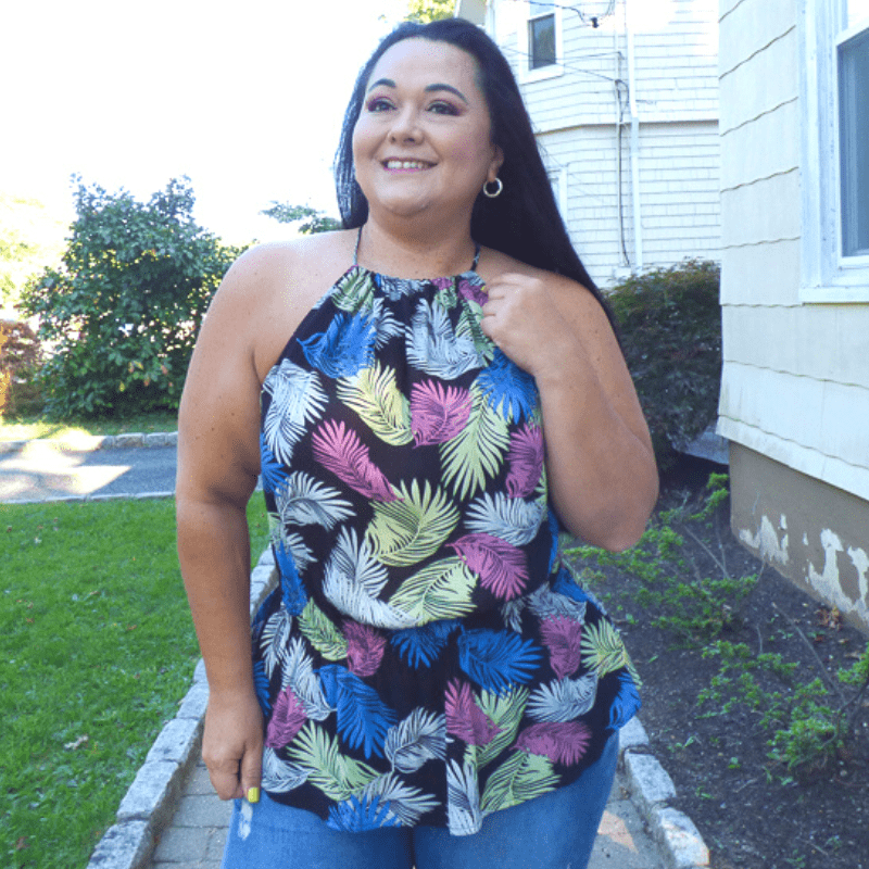 This Tropical Printed Halter Neck Plus Size Top is made from a lightweight, non-stretch nylon material making it easy to wear. This tophas an elastic waistband. The bodice has a Halter neckline, which is a high front with straps that come around and tie in the back.