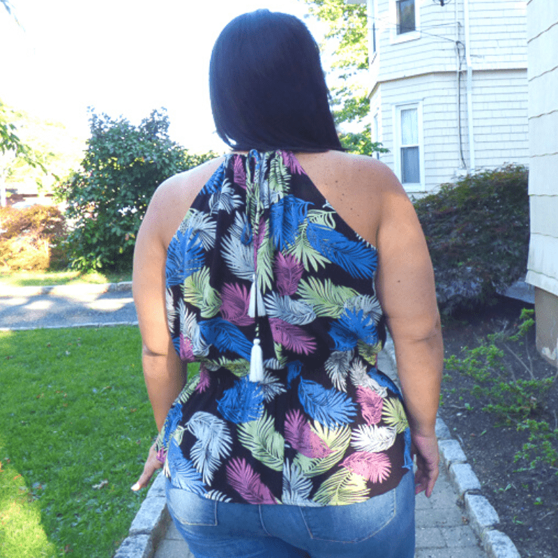 This Tropical Printed Halter Neck Plus Size Top is made from a lightweight, non-stretch nylon material making it easy to wear. This tophas an elastic waistband. The bodice has a Halter neckline, which is a high front with straps that come around and tie in the back.