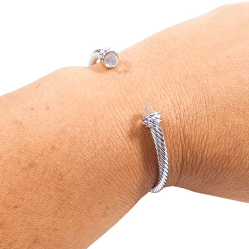 Fashion Jewelry Twist Bangle Bracelet with White Stone Accent in Silver Color.