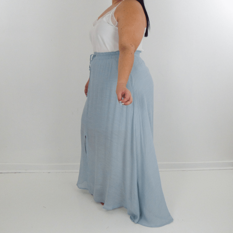 Our Yasmin Plus Size Maxi Skirt is a must-have in your spring and summer wardrobe. The cozy flowy material will keep you cool throughout the warmer months.